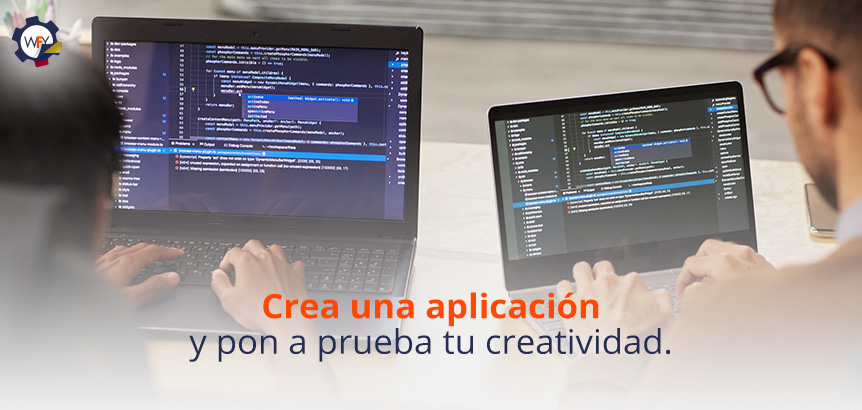 Dos Programadores Frente a sus Computadores Creando una Aplicacin que Pone a Prueba su Creatividad